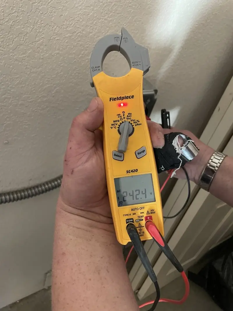 Voltage testing with clamp meter during Outlet Installation in Reading